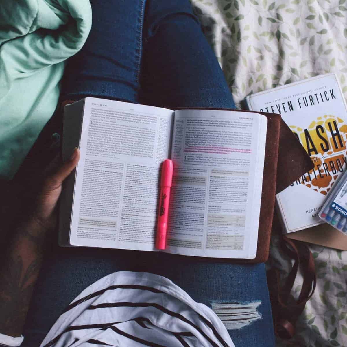 A woman reading in her Sophrology journal