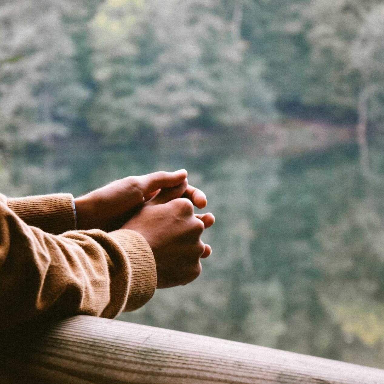 A person looking over a lake