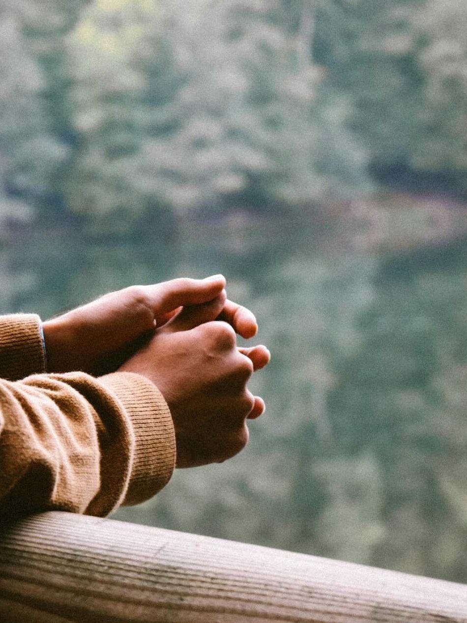 A person looking over a lake