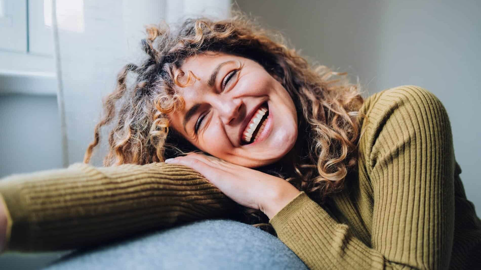 Women at Menopause age on sofa