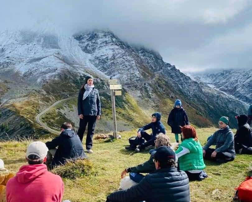 Dominique Antiglio Speaking at a retreat in mountains
