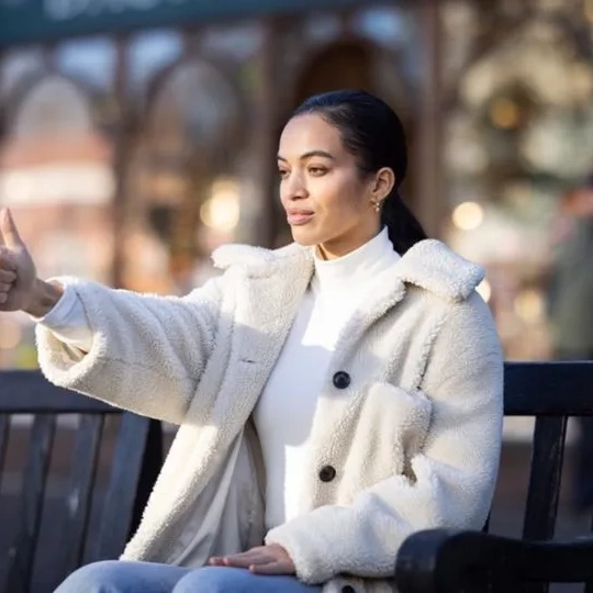 Woman in a white coat practising Sophrology
