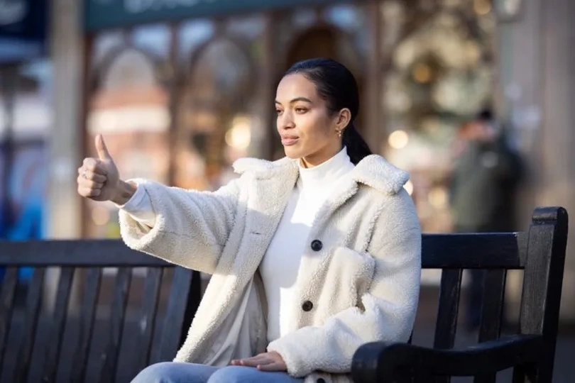Woman in a white coat practising Sophrology