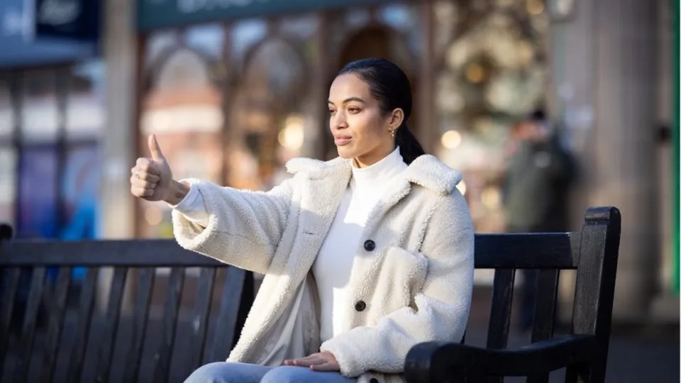 Woman in a white coat practising Sophrology